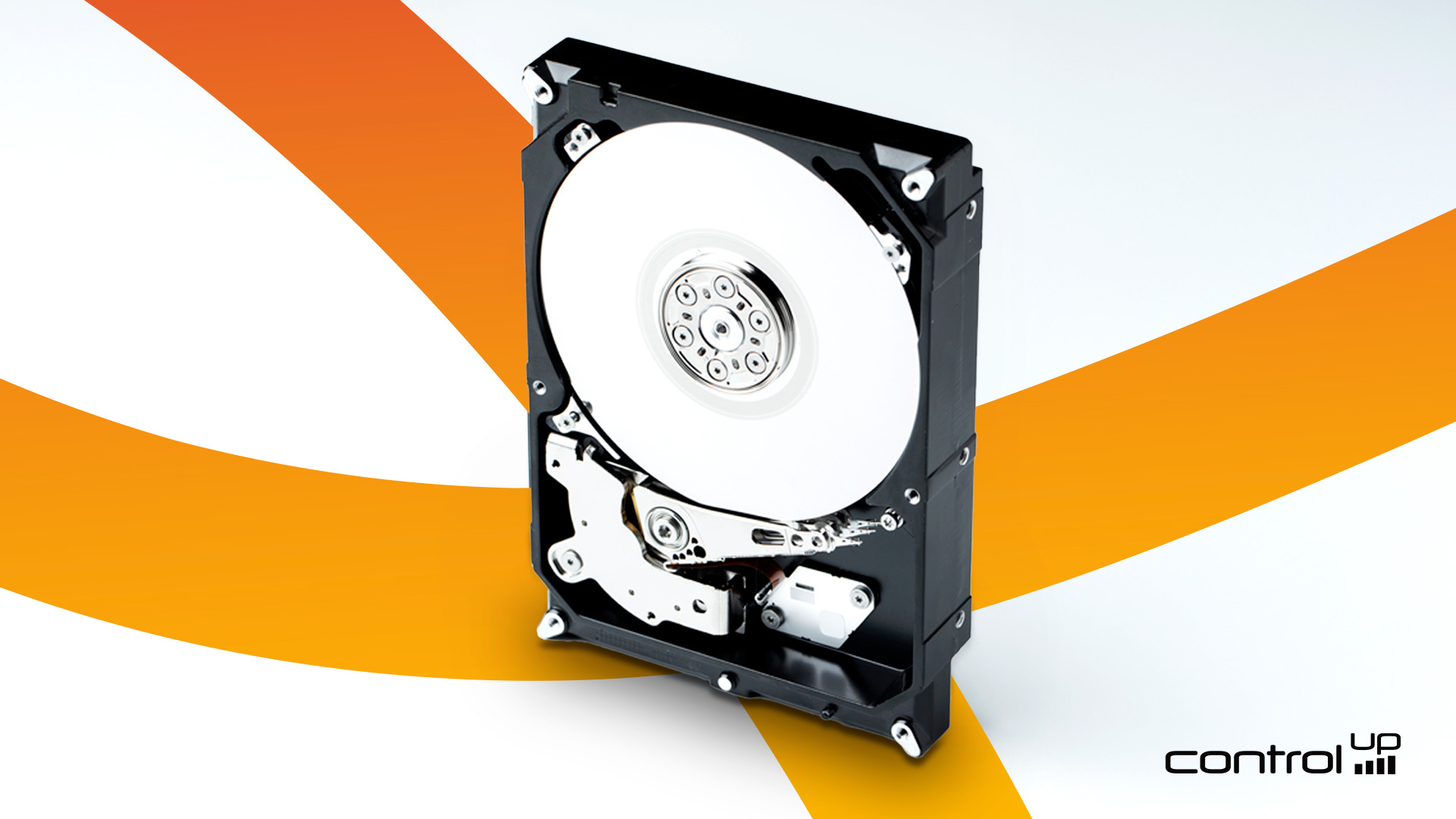 A computer hard drive standing upright with two orange lines in the background to illustrate the ControlUp Disk Monitor as a new IT solutions